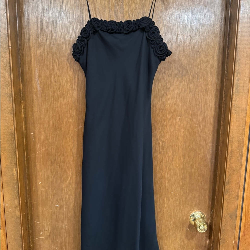 Elegant Black Dress with Floral Detailing